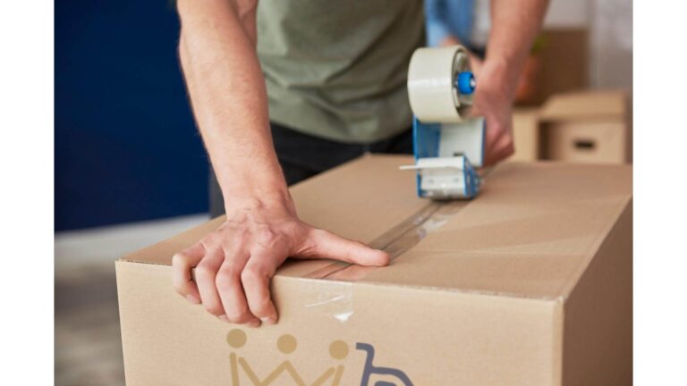 Professional mover packing a box during a local move in DC